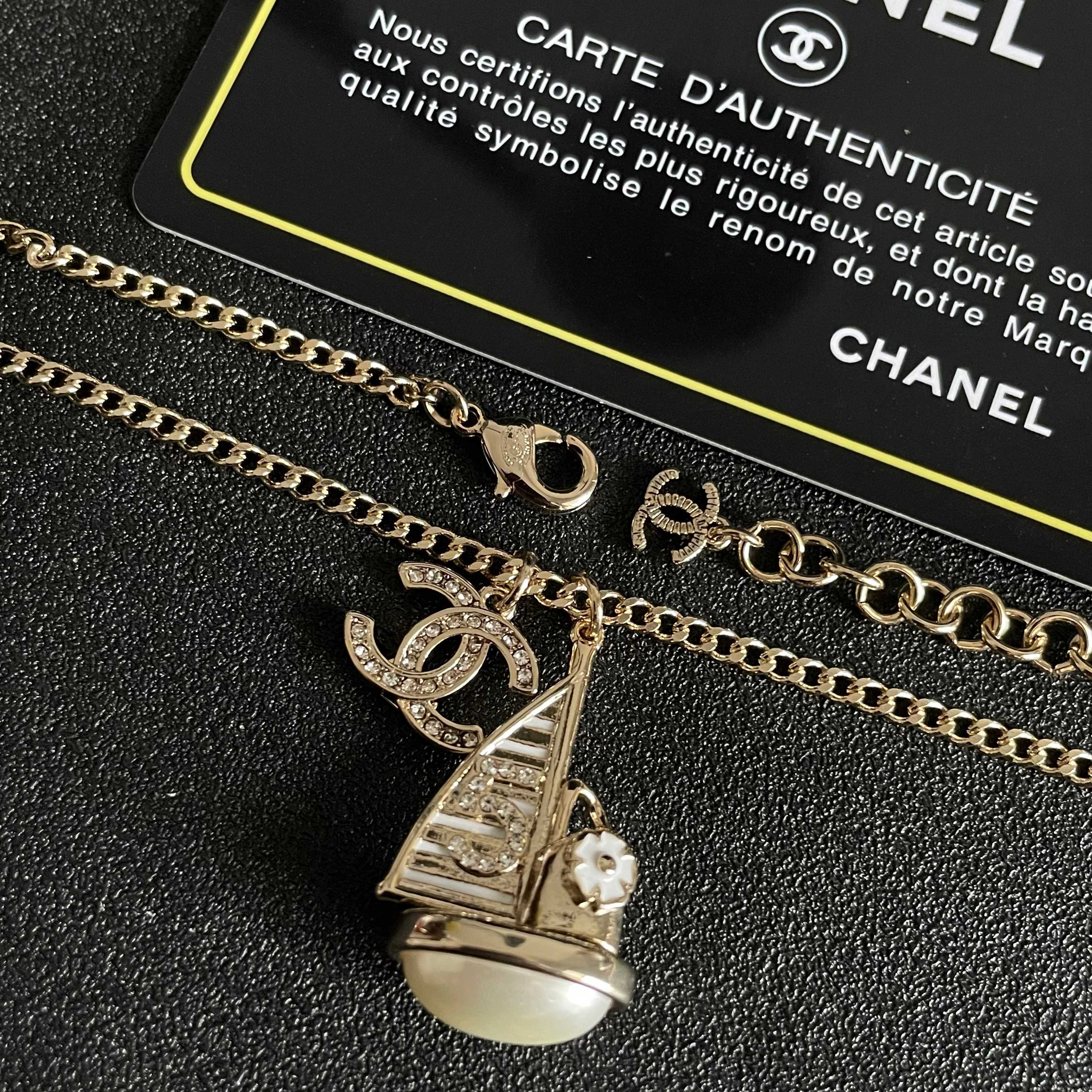 CHANEL 26S DOUBLE C LOGO SAILBOAT PENDANT NECKLACE WITH PEARL IN GOLD METAL 630060