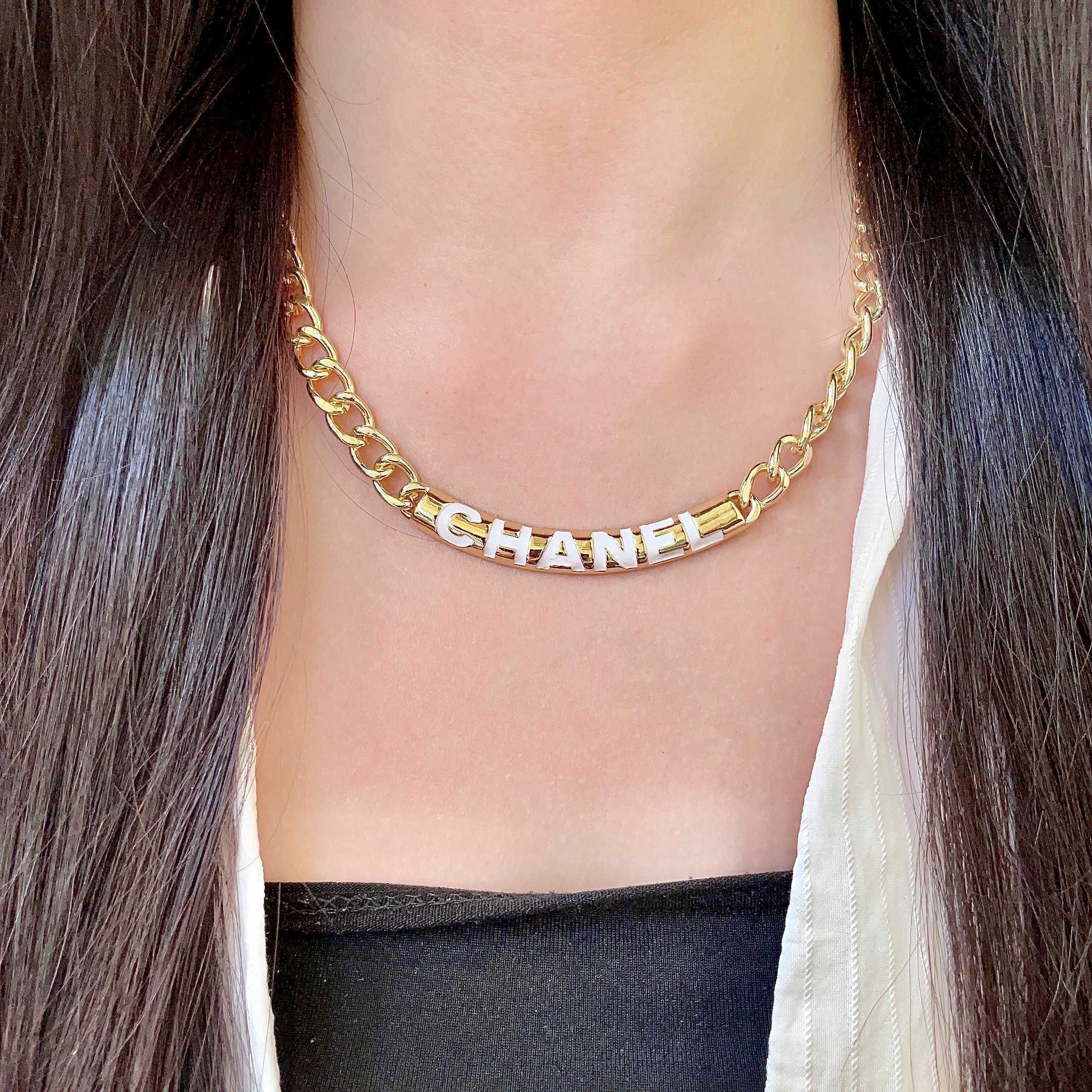 CHANEL 26S CHANEL LETTER LOGO CHAIN NECKLACE IN GOLD METAL WITH CC CHARM 630063