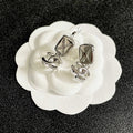 CHANEL 26S DOUBLE C LOGO QUILTED RECTANGULAR DROP EARRINGS IN SILVER METAL 630071