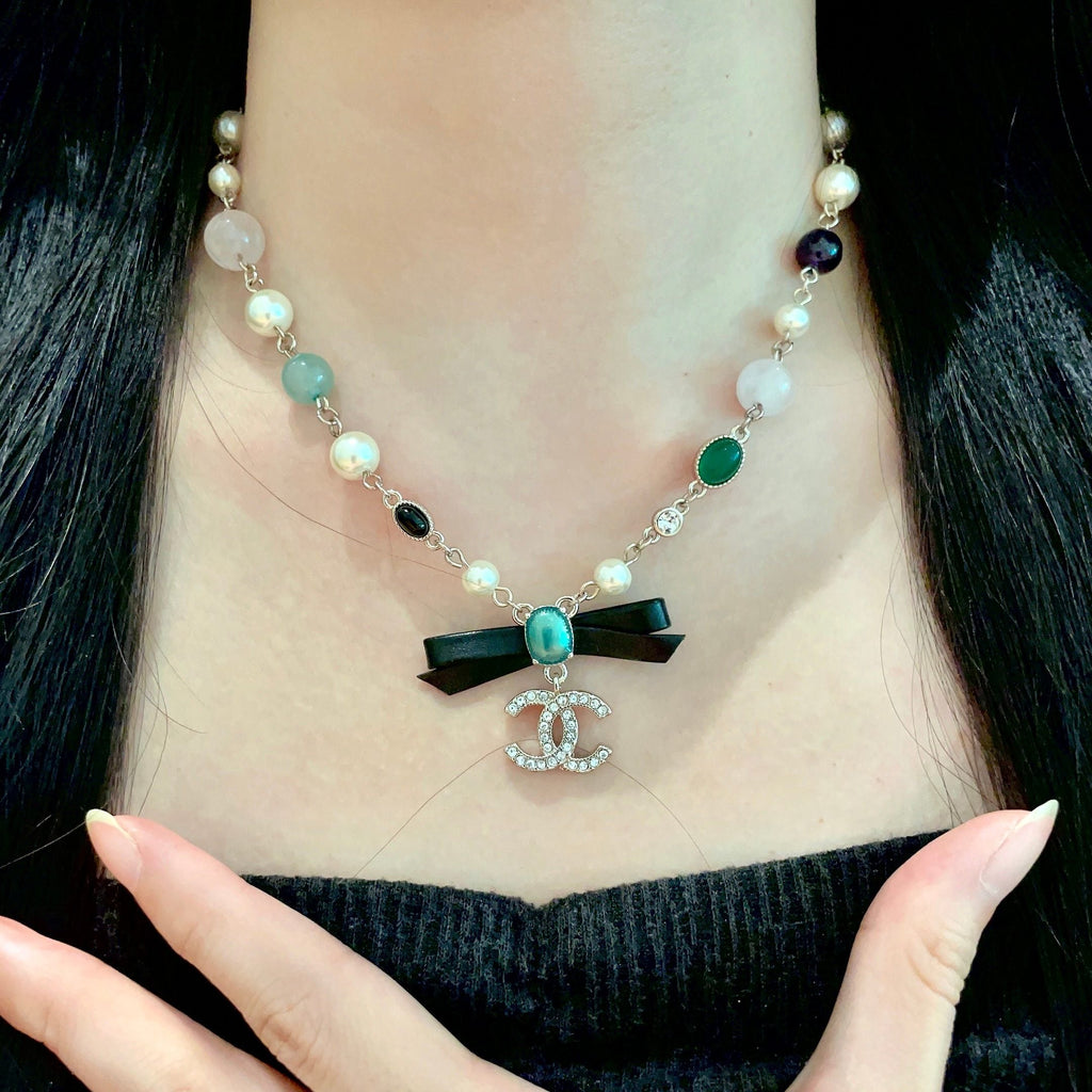 CHANEL 26S DOUBLE C LOGO MULTICOLOR GEMSTONE PEARL CHAIN BRACELET WITH CRYSTAL PENDANT IN GOLD METAL 629888