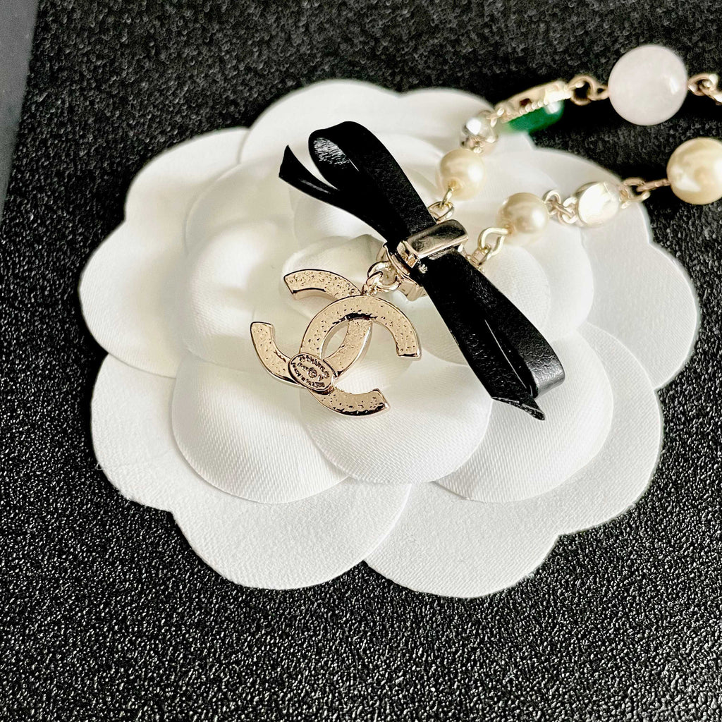CHANEL 26S DOUBLE C LOGO MULTICOLOR GEMSTONE PEARL CHAIN BRACELET WITH CRYSTAL PENDANT IN GOLD METAL 629888