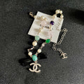 CHANEL 26S DOUBLE C LOGO MULTICOLOR GEMSTONE PEARL CHAIN BRACELET WITH CRYSTAL PENDANT IN GOLD METAL 629888