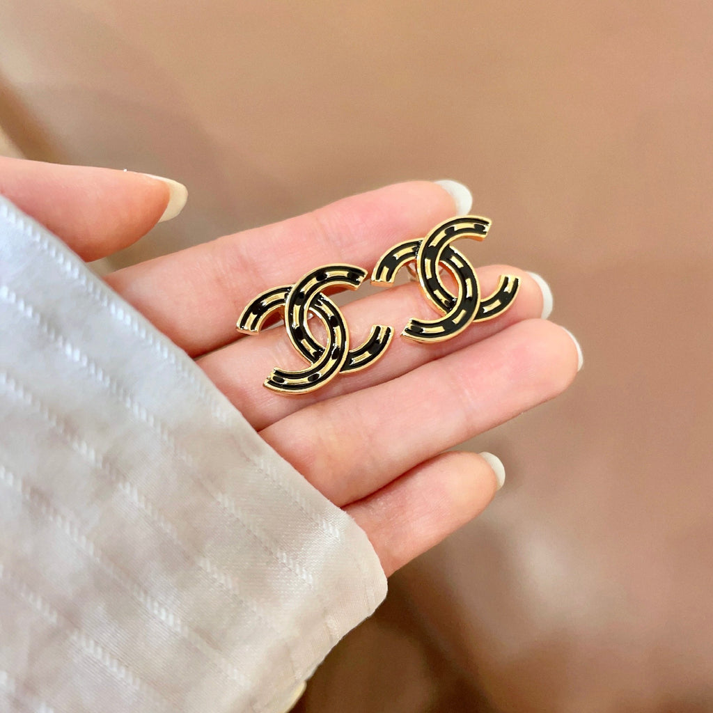 CHANEL 26S DOUBLE C LOGO BLACK ENAMEL STUD EARRINGS IN GOLD METAL 629902