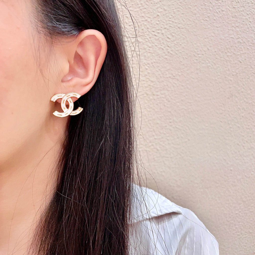 CHANEL 26S DOUBLE C LOGO WHITE ENAMEL STUD EARRINGS IN GOLD METAL 629903