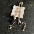 CHANEL 26S DOUBLE C LOGO BLACK FLOWER & PEARL CHARM PENDANT NECKLACE WITH CRYSTAL DETAIL IN GOLD METAL 631012