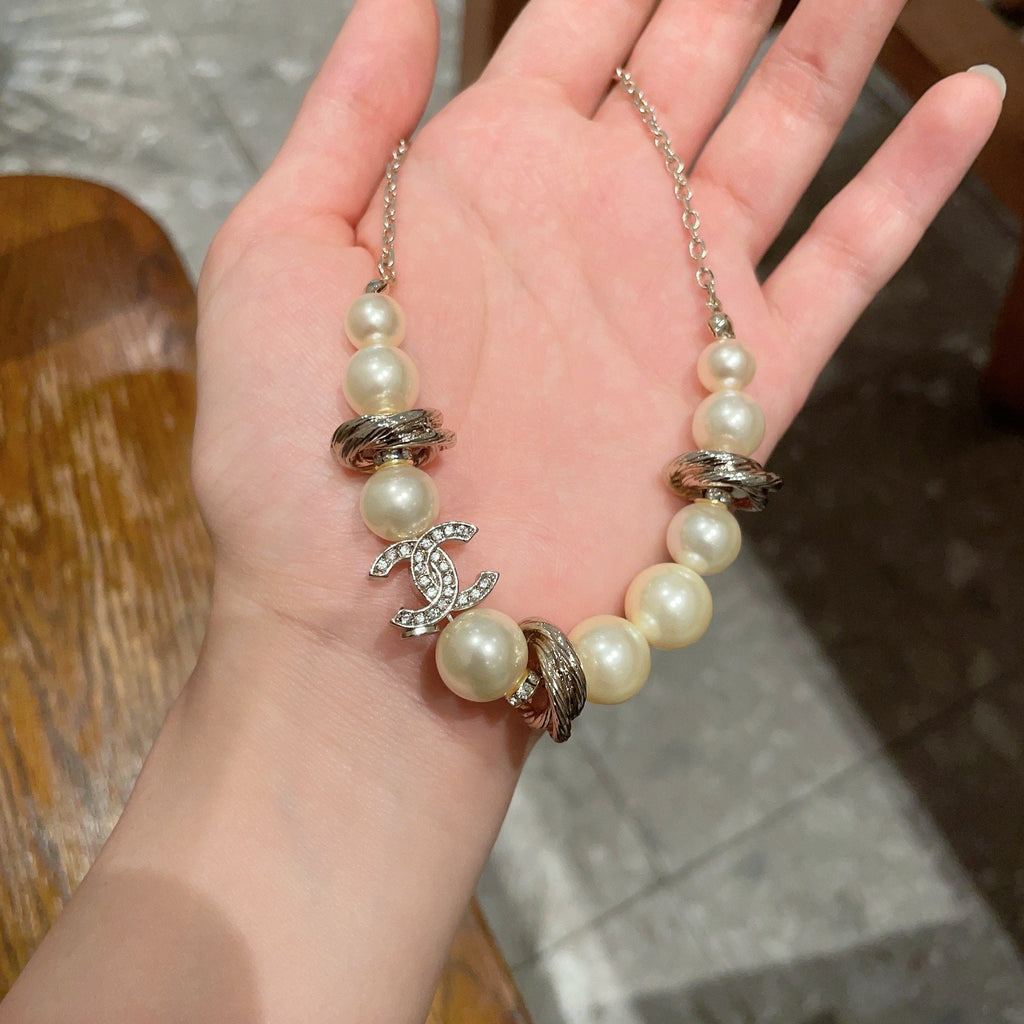 CHANEL 26S DOUBLE C LOGO PEARL BEADED BRACELET WITH CRYSTAL DETAIL IN GOLD METAL 631014