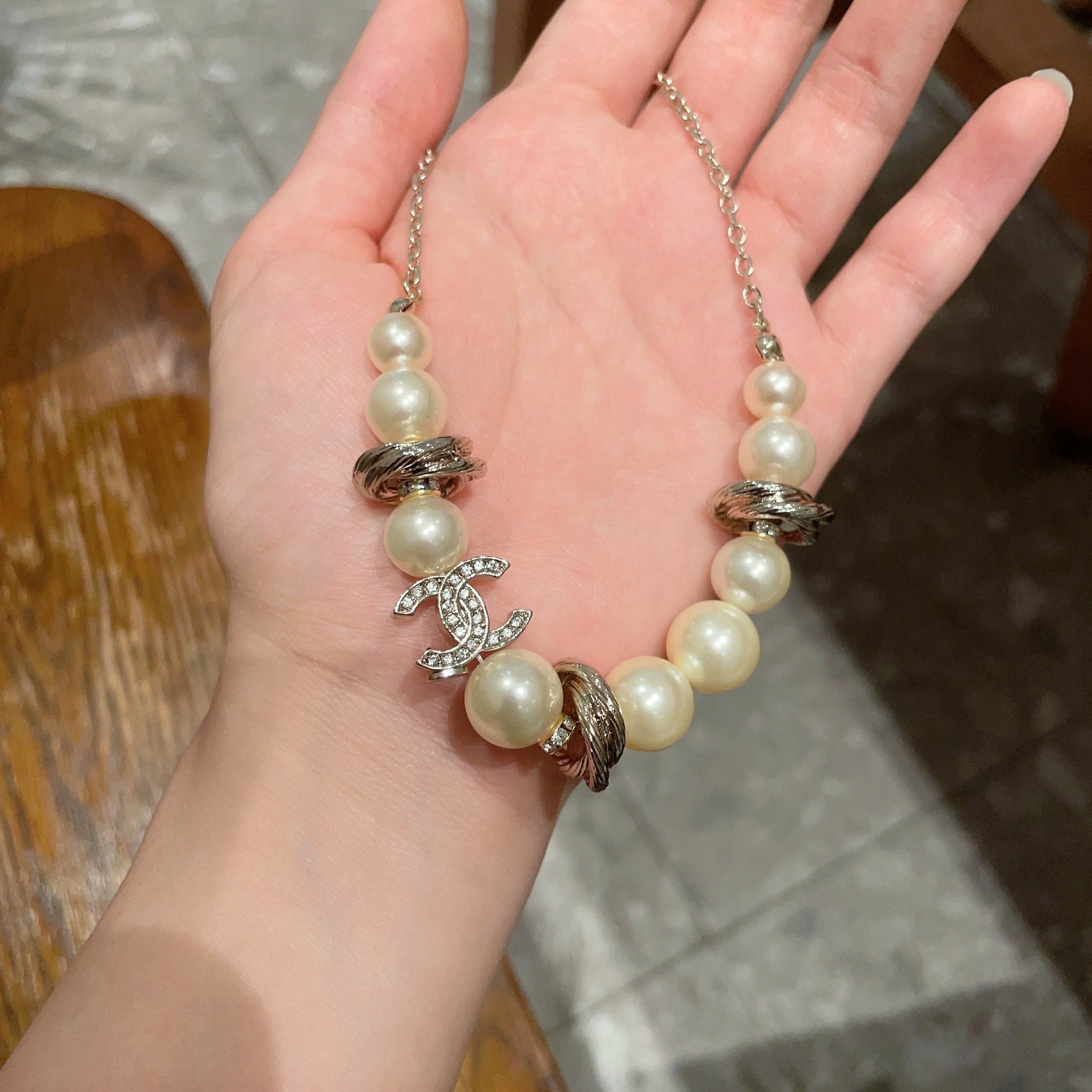 CHANEL 26S DOUBLE C LOGO PEARL BEADED BRACELET WITH CRYSTAL DETAIL IN GOLD METAL 631014