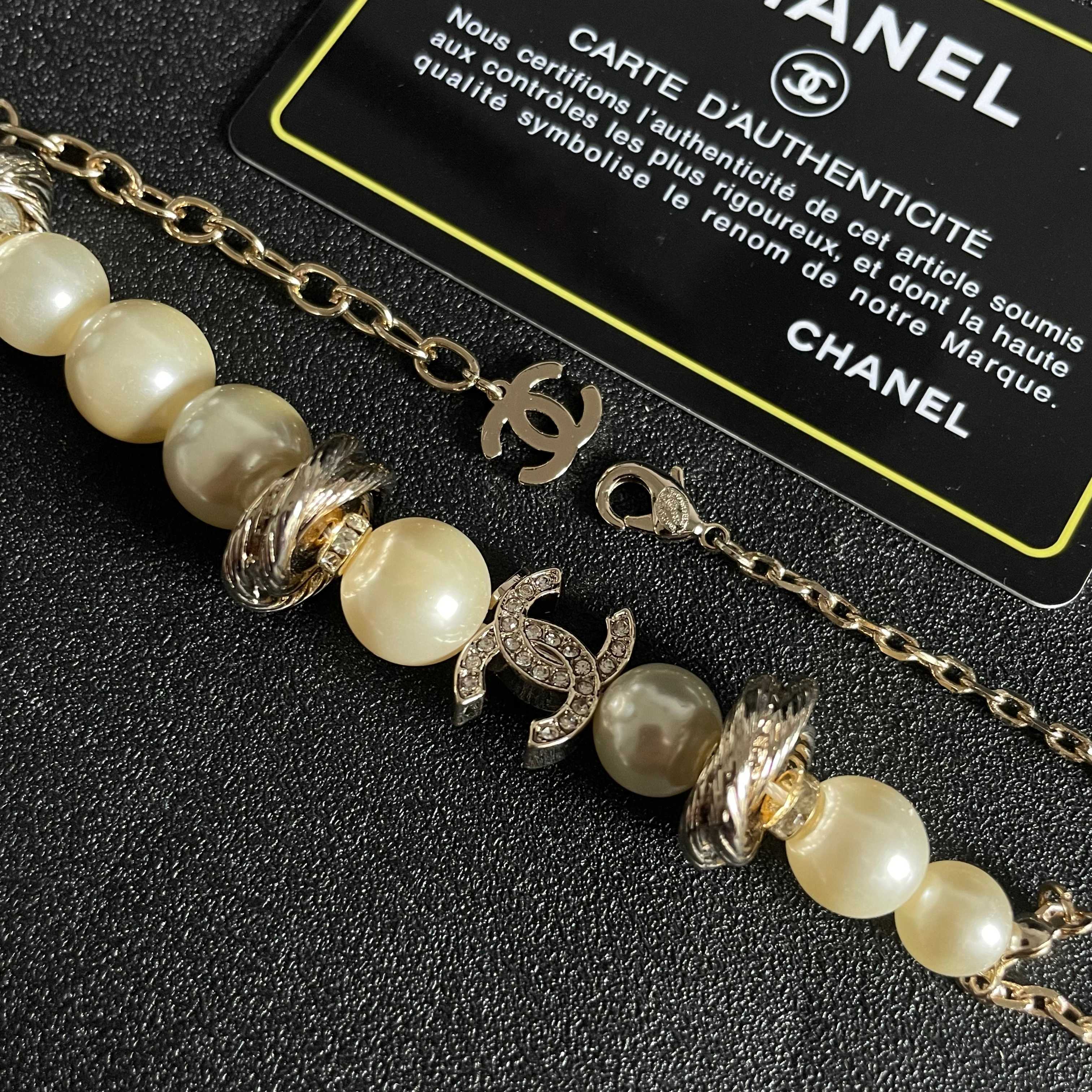 CHANEL 26S DOUBLE C LOGO PEARL BEADED BRACELET WITH CRYSTAL DETAIL IN GOLD METAL 631014