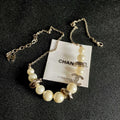 CHANEL 26S DOUBLE C LOGO PEARL BEADED BRACELET WITH CRYSTAL DETAIL IN GOLD METAL 631014