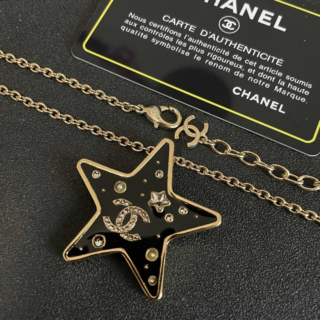 CHANEL 26S DOUBLE C LOGO BLACK ENAMEL STAR PENDANT NECKLACE WITH CRYSTAL DETAIL IN GOLD METAL 631015