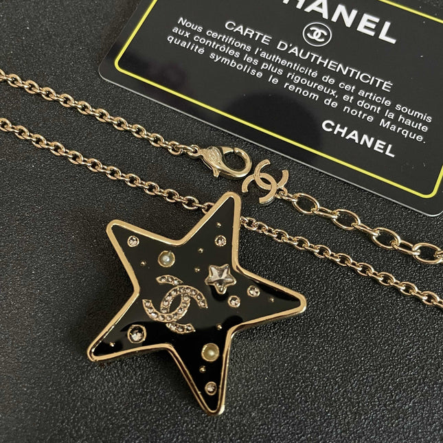 CHANEL 26S DOUBLE C LOGO BLACK ENAMEL STAR PENDANT NECKLACE WITH CRYSTAL DETAIL IN GOLD METAL 631015