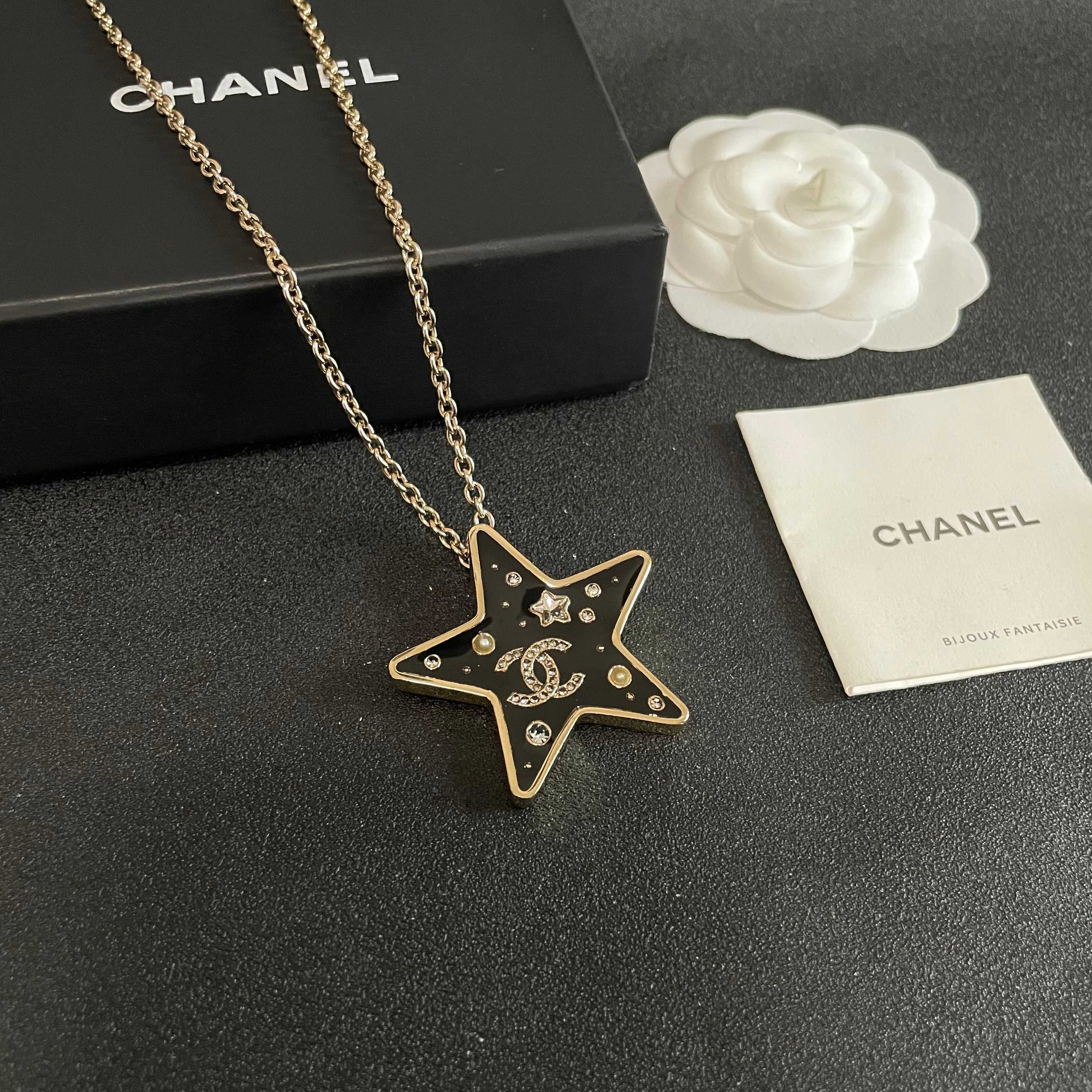 CHANEL 26S DOUBLE C LOGO BLACK ENAMEL STAR PENDANT NECKLACE WITH CRYSTAL DETAIL IN GOLD METAL 631015