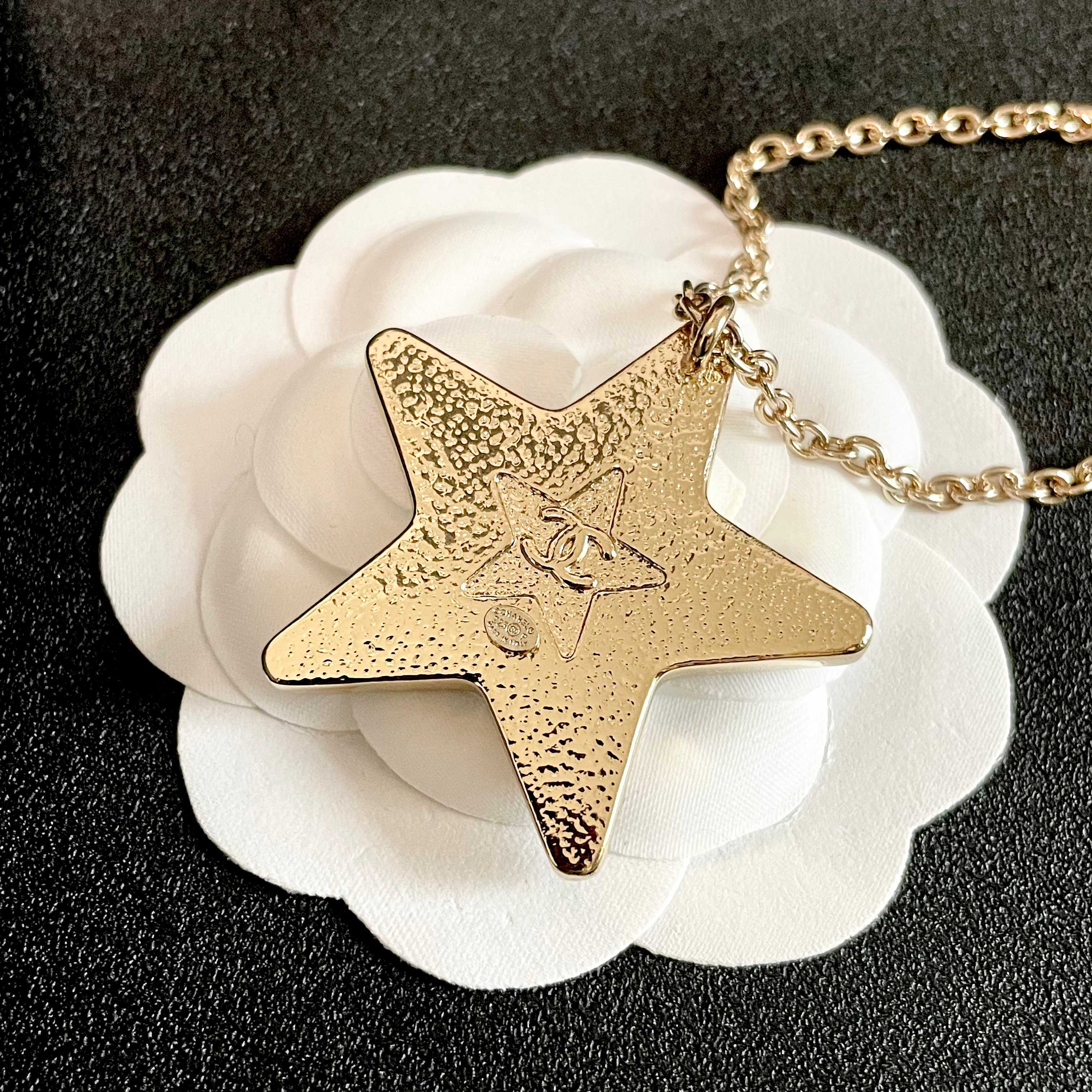 CHANEL 26S DOUBLE C LOGO BLACK ENAMEL STAR PENDANT NECKLACE WITH CRYSTAL DETAIL IN GOLD METAL 631015