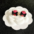 CHANEL 26S DOUBLE C LOGO BLACK BOW PINK ENAMEL ROUND STUD EARRINGS IN GOLD METAL 631023