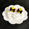 CHANEL 26S DOUBLE C LOGO BLACK BOW YELLOW ENAMEL ROUND STUD EARRINGS IN GOLD METAL 631024
