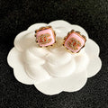 CHANEL 26S DOUBLE C LOGO PINK ENAMEL SQUARE STUD EARRINGS WITH CRYSTAL DETAIL IN GOLD METAL 631027
