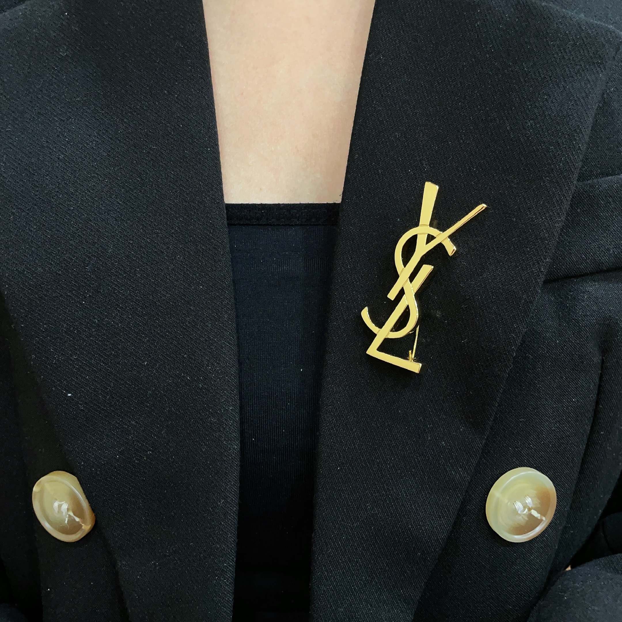 YSL 26S MONOGRAM BROOCH IN GOLD TONE METAL 630942
