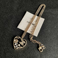 CHANEL 26S DOUBLE C LOGO HEART CHARM NECKLACE WITH NO.5 & FLORAL DETAIL IN GOLD METAL 630796