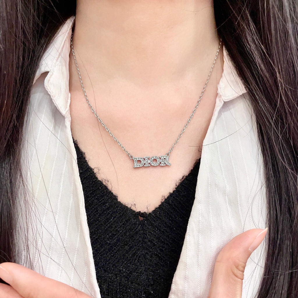 CD 26S PAVE LOGO LETTER NECKLACE IN SILVER TONE METAL 631805