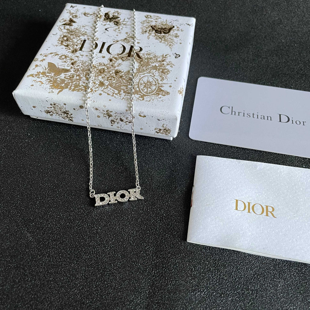 CD 26S PAVE LOGO LETTER NECKLACE IN SILVER TONE METAL 631805