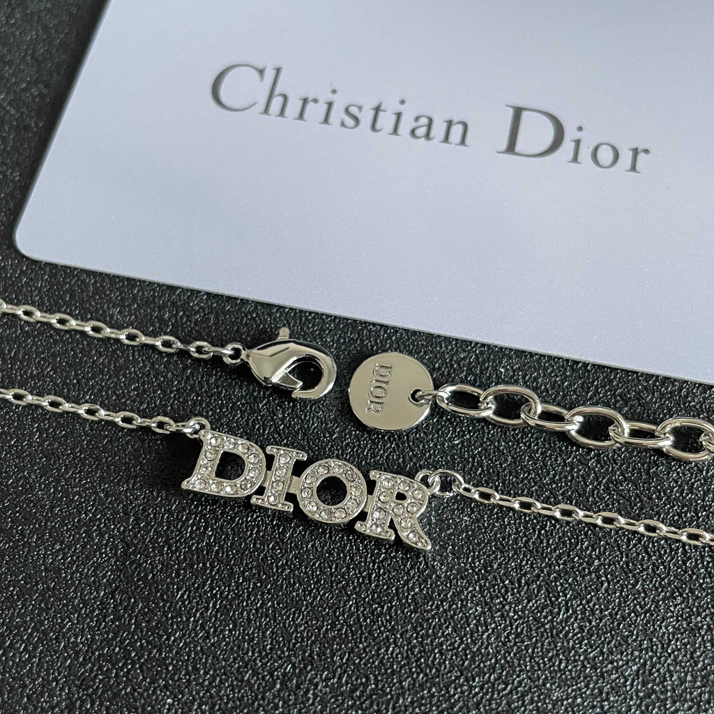 CD 26S PAVE LOGO LETTER NECKLACE IN SILVER TONE METAL 631805