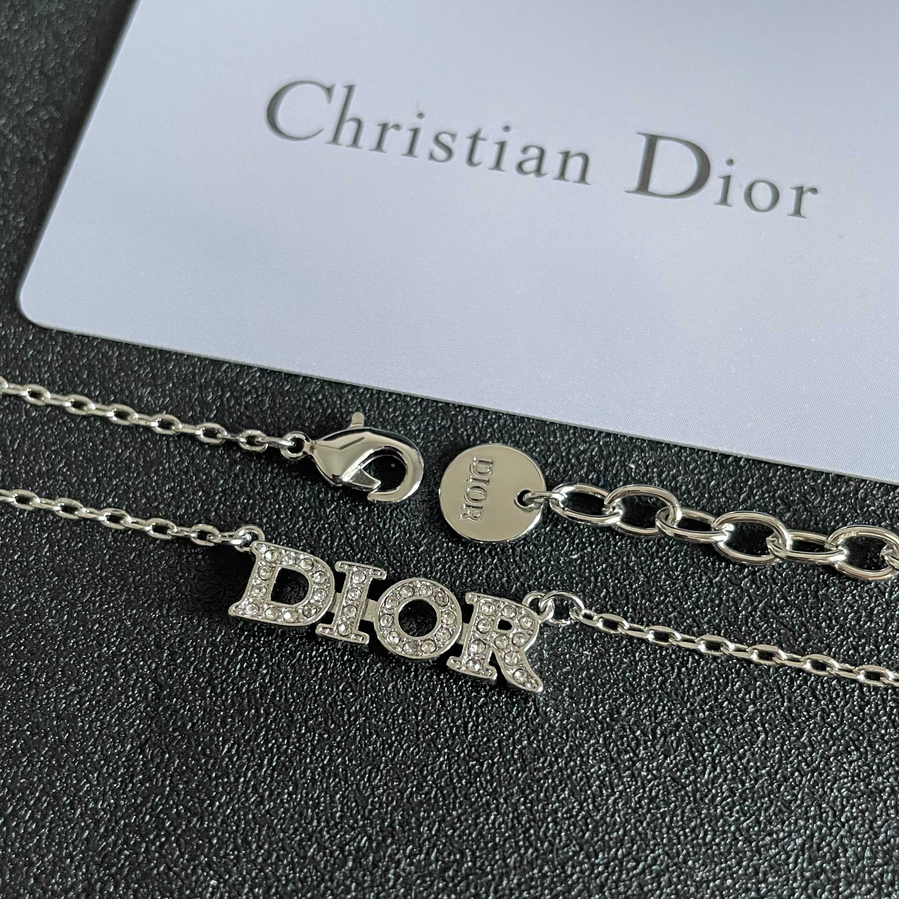 CD 26S PAVE LOGO LETTER NECKLACE IN SILVER TONE METAL 631805