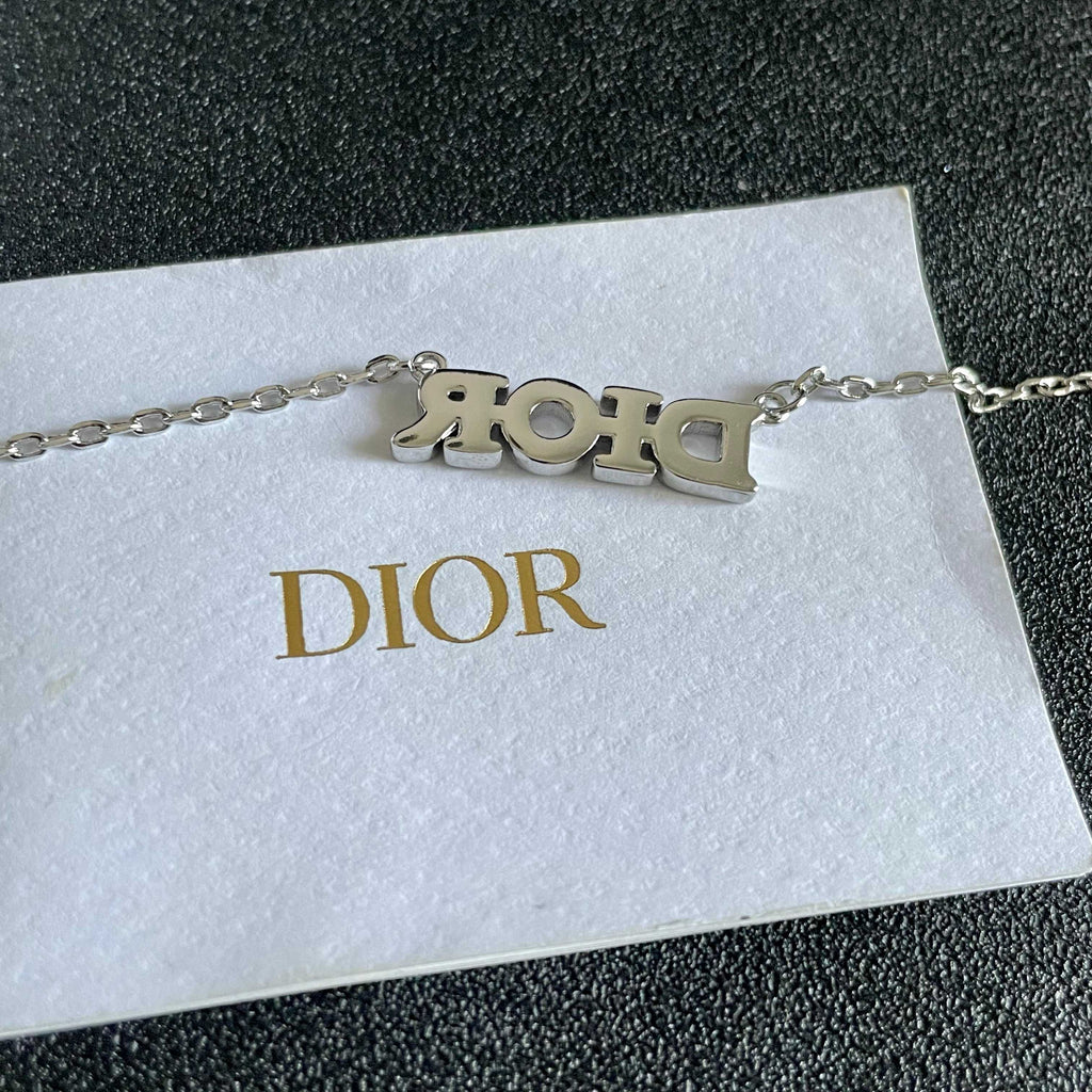 CD 26S PAVE LOGO LETTER NECKLACE IN SILVER TONE METAL 631805