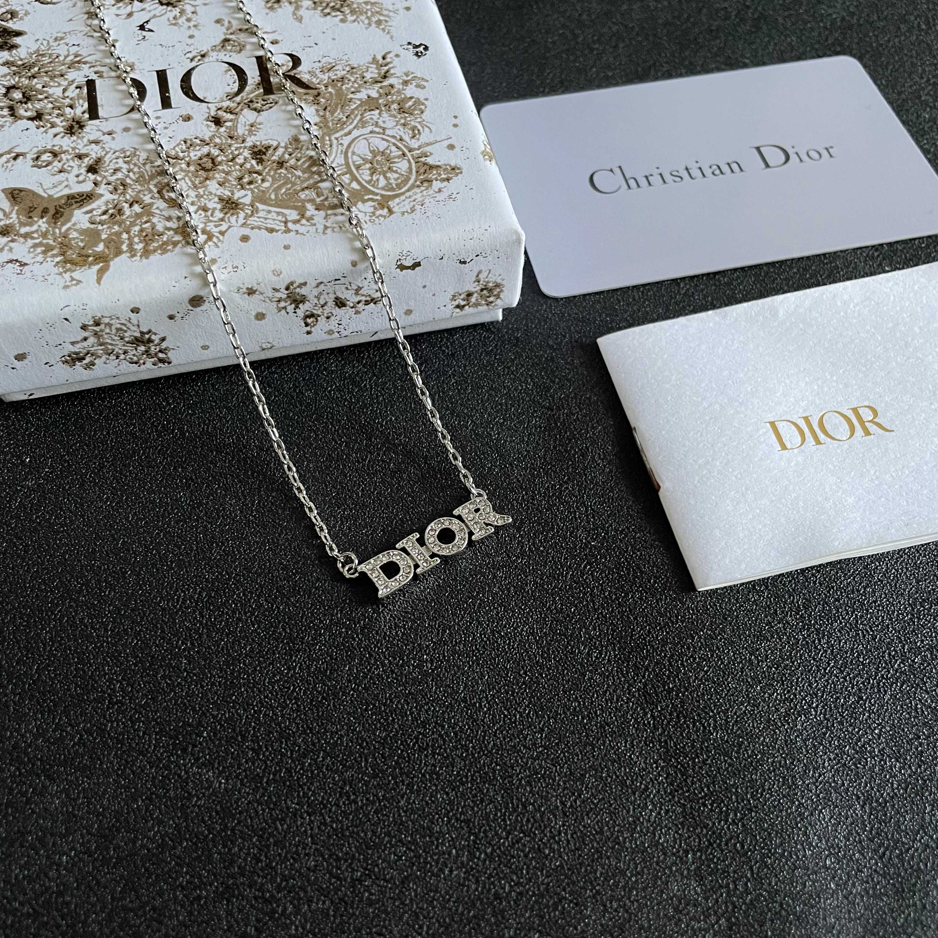 CD 26S PAVE LOGO LETTER NECKLACE IN SILVER TONE METAL 631805