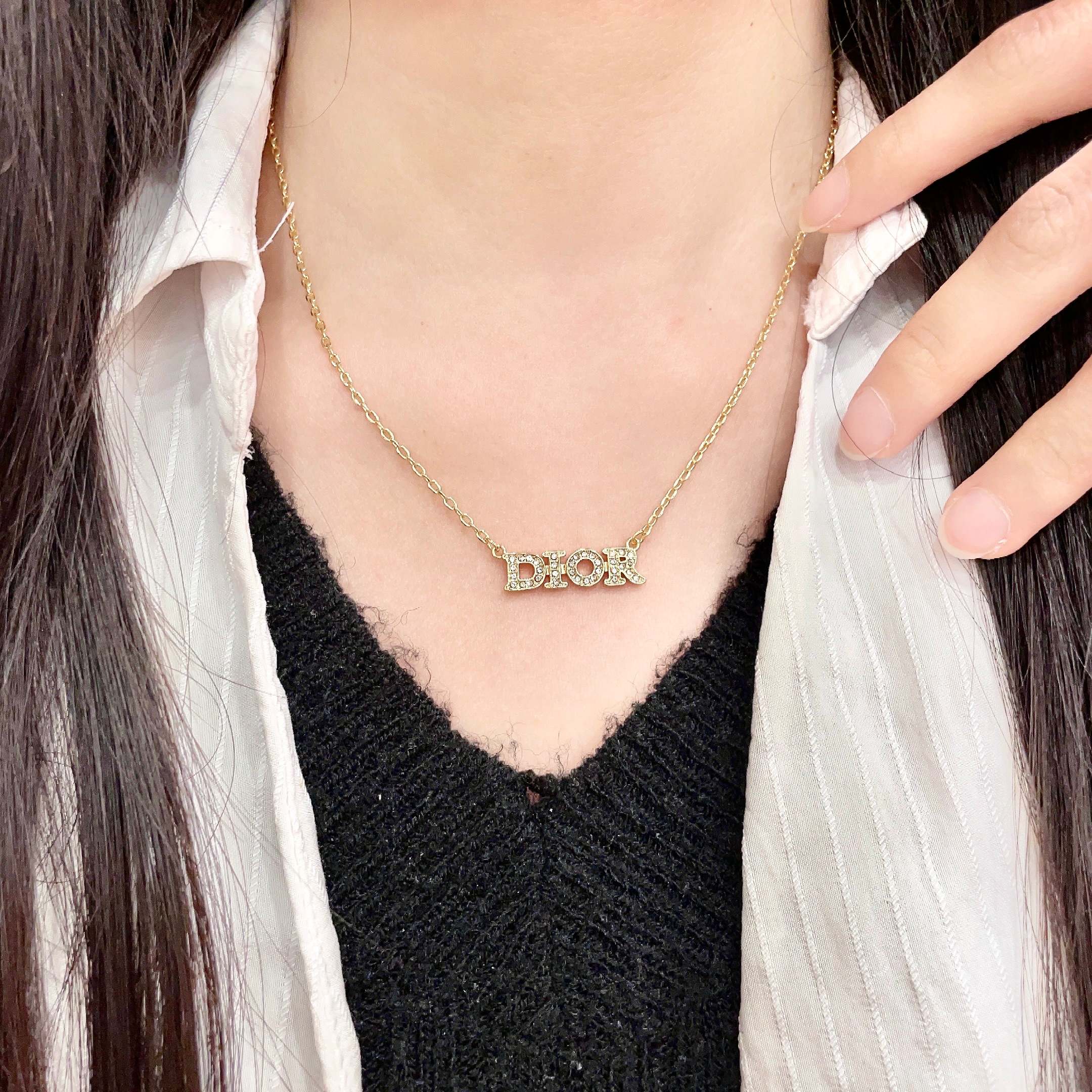CD 26S PAVE LOGO LETTER NECKLACE IN GOLD TONE METAL 631806