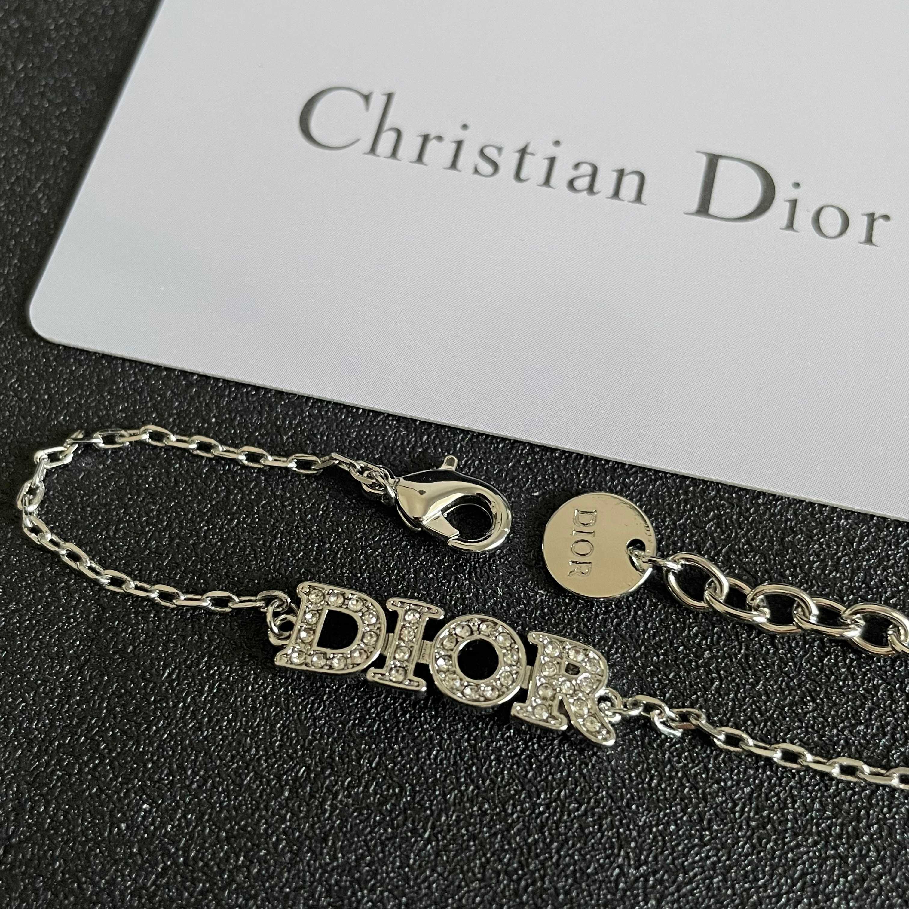 CD 26S PAVE LOGO LETTER BRACELET IN SILVER TONE METAL 631807