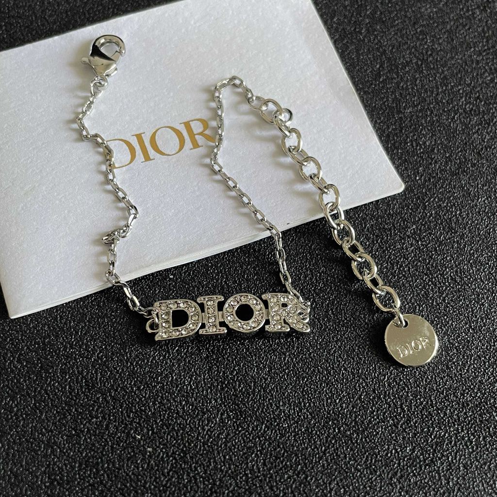CD 26S PAVE LOGO LETTER BRACELET IN SILVER TONE METAL 631807