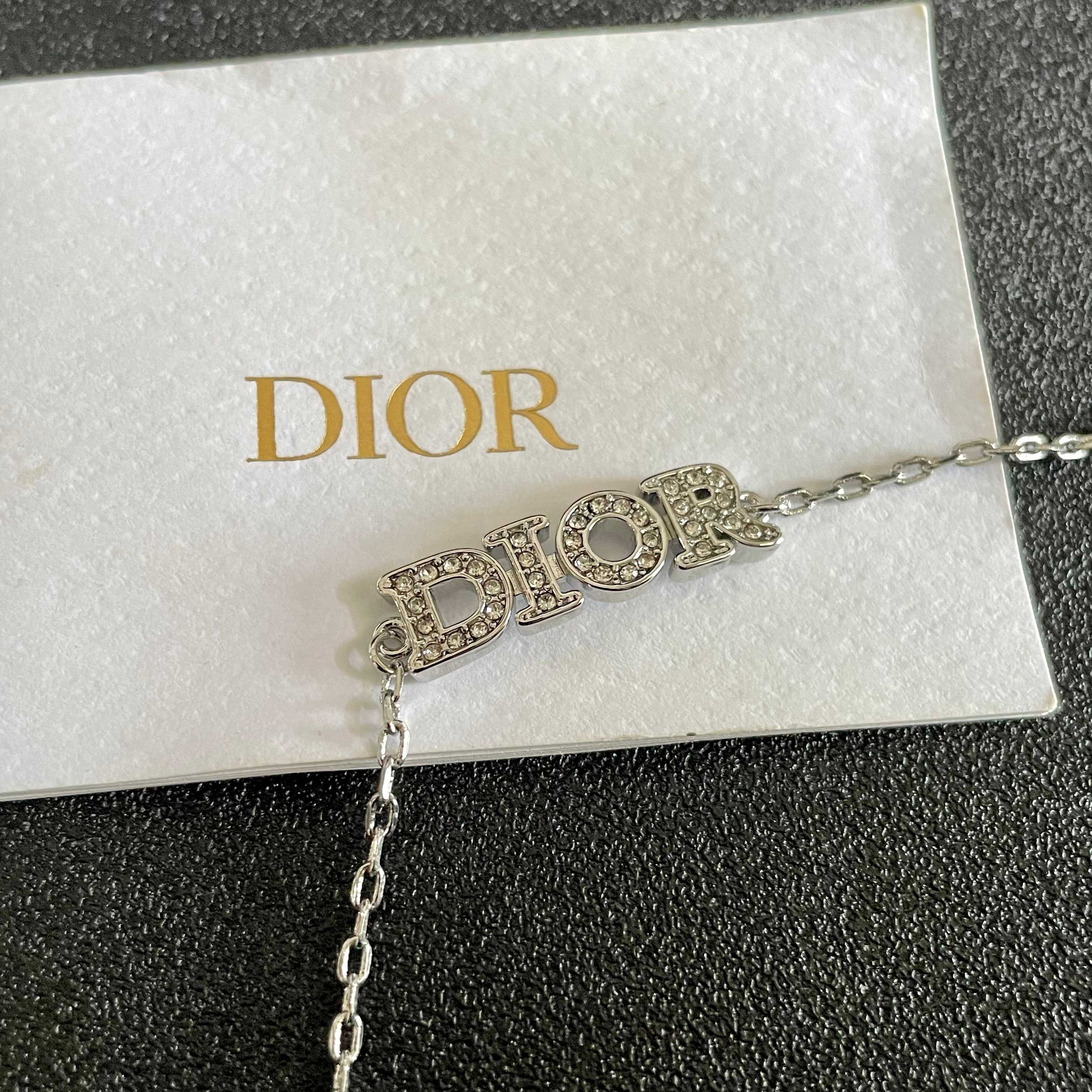 CD 26S PAVE LOGO LETTER BRACELET IN SILVER TONE METAL 631807