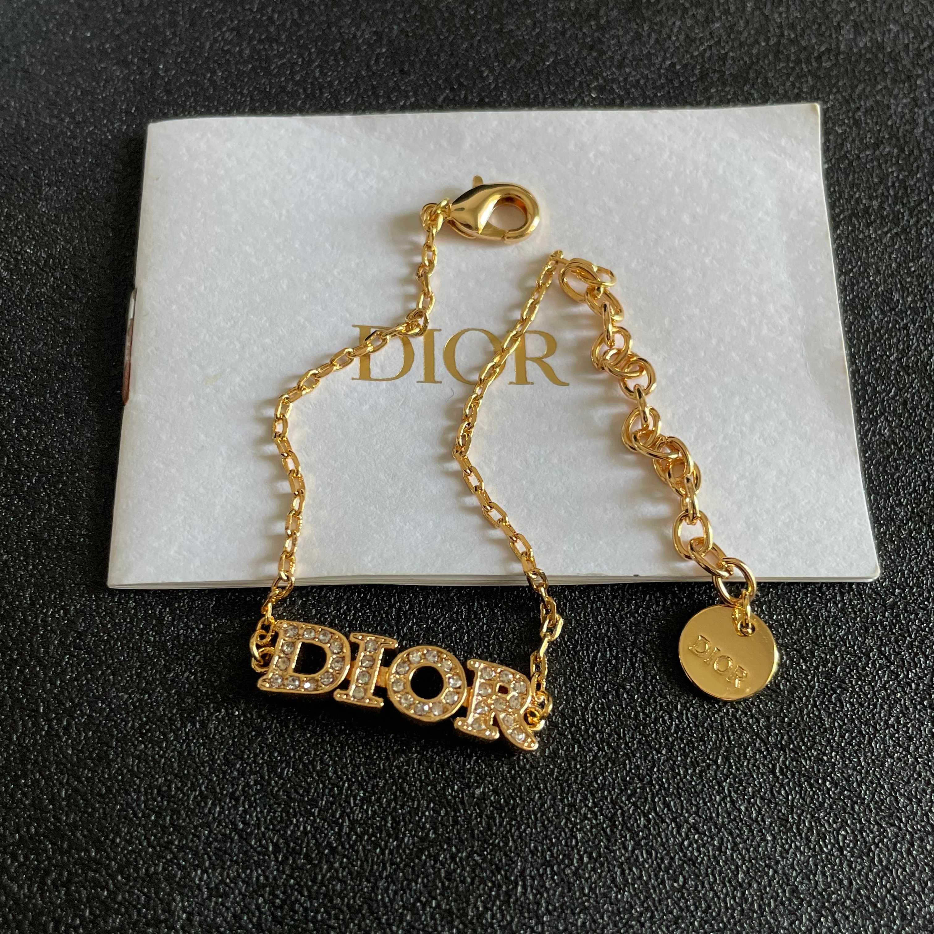 CD 26S PAVE LOGO LETTER BRACELET IN GOLD TONE METAL 631808
