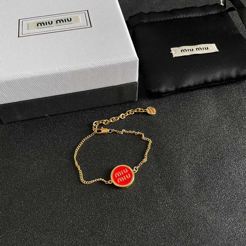 MIUMIU 26S LOGO ROUND BRACELET IN RED ENAMEL AND GOLD TONE METAL 631810