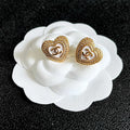 CHANEL 26S DOUBLE C LOGO PAVE HEART STUD EARRINGS WITH WHITE ENAMEL IN GOLD METAL 631815