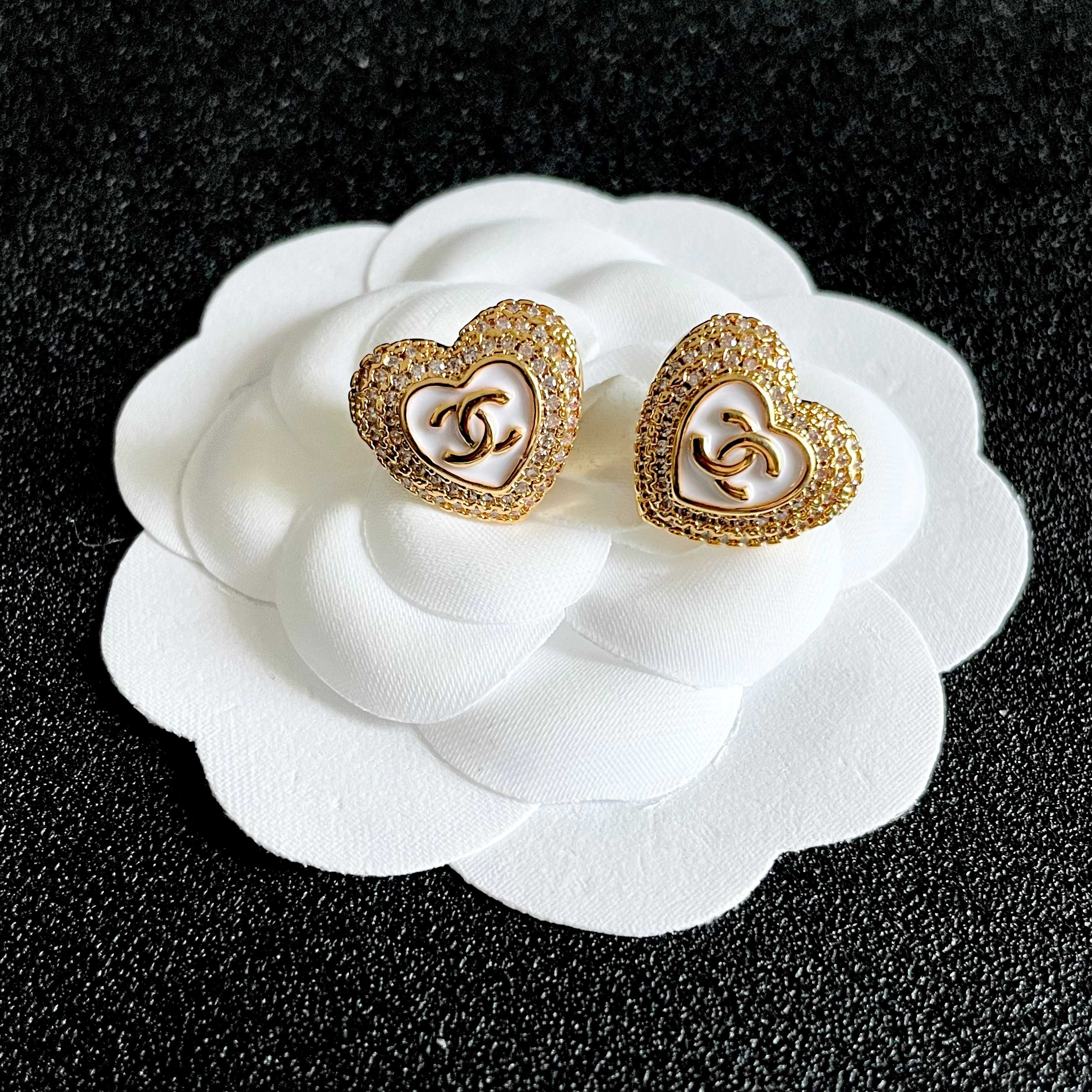 CHANEL 26S DOUBLE C LOGO PAVE HEART STUD EARRINGS WITH WHITE ENAMEL IN GOLD METAL 631815