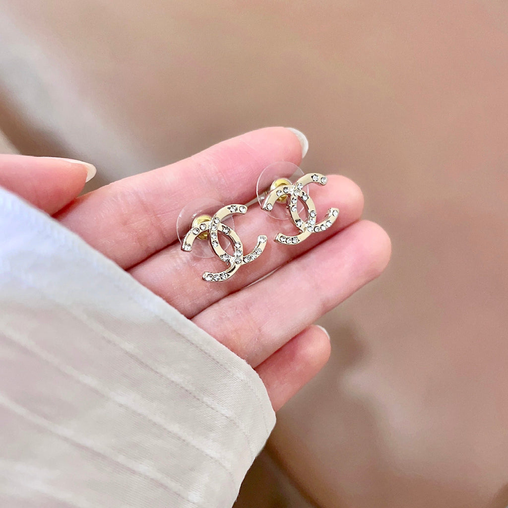 CHANEL 26S DOUBLE C LOGO CRYSTAL STUD EARRINGS IN GOLD METAL 631817