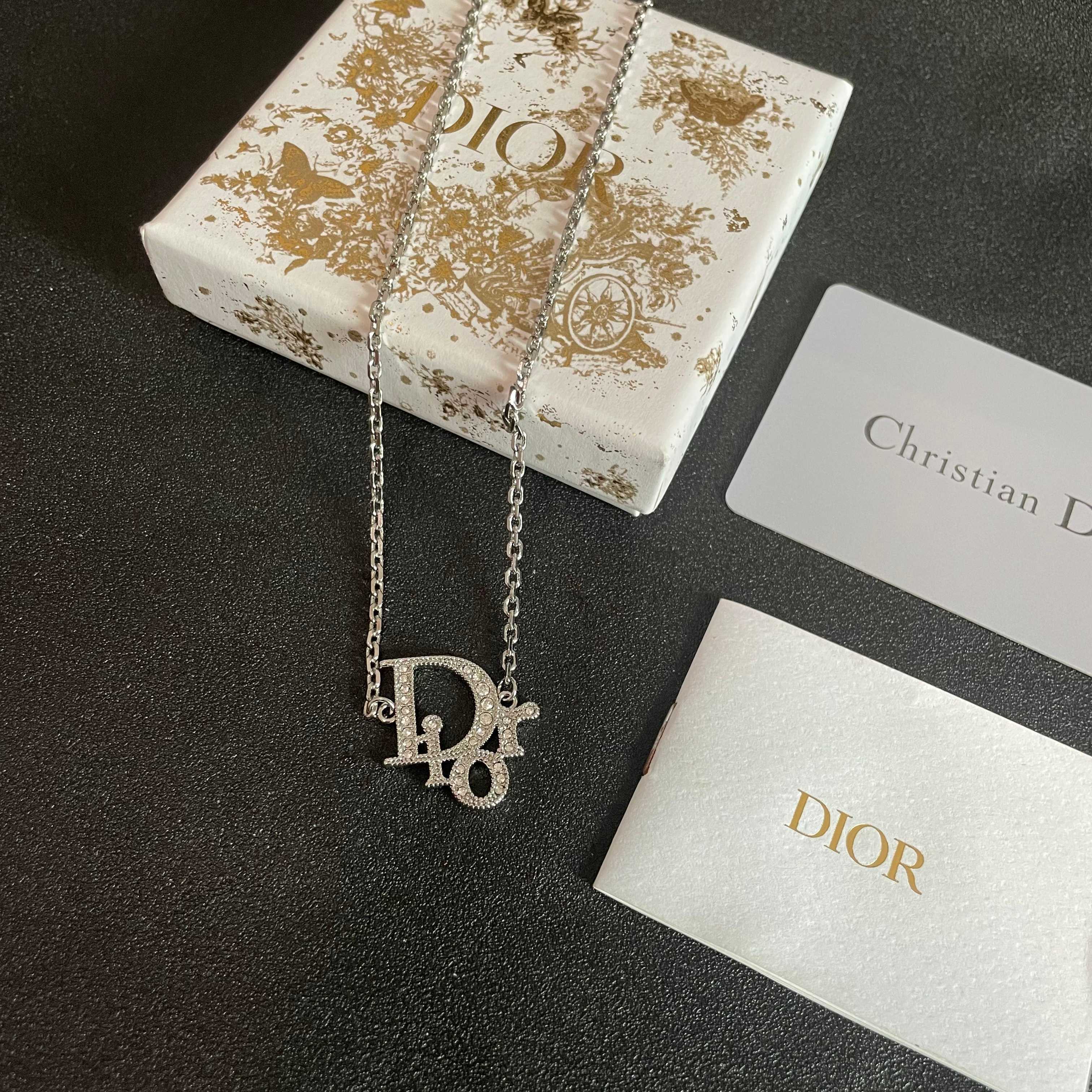 CD 26S CRYSTAL DIOR LOGO PENDANT NECKLACE IN SILVER METAL 631900
