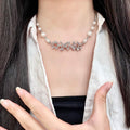 CHANEL 26S CHANEL LETTER CRYSTAL NECKLACE WITH PEARL DETAILS IN SILVER METAL 631901