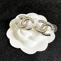 CHANEL 26S DOUBLE C LOGO CRYSTAL STUD EARRINGS IN SILVER METAL 631902