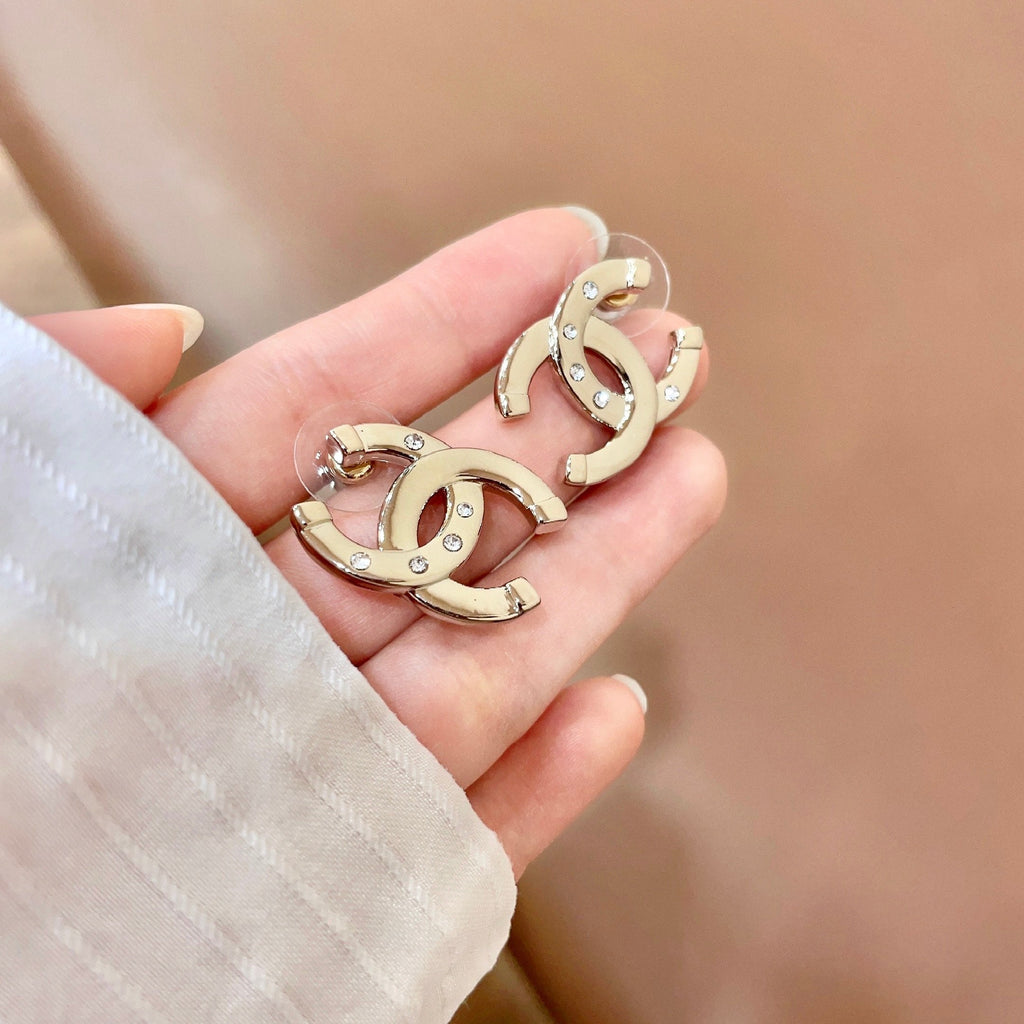 CHANEL 26S DOUBLE C LOGO CRYSTAL STUD EARRINGS IN GOLD METAL 631903