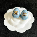 CHANEL 26S DOUBLE C LOGO OVAL STUD EARRINGS IN BLUE MARBLE ENAMEL WITH GOLD METAL 631908