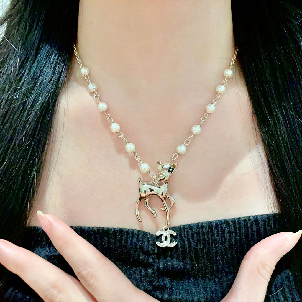 CHANEL 26S DOUBLE C LOGO FAWN CHARM NECKLACE WITH PEARL CHAIN IN GOLD METAL 633292