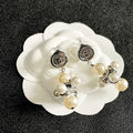CHANEL 26S CHANEL CC LOGO PEARL CLUSTER DROP EARRINGS IN SILVER METAL 633302