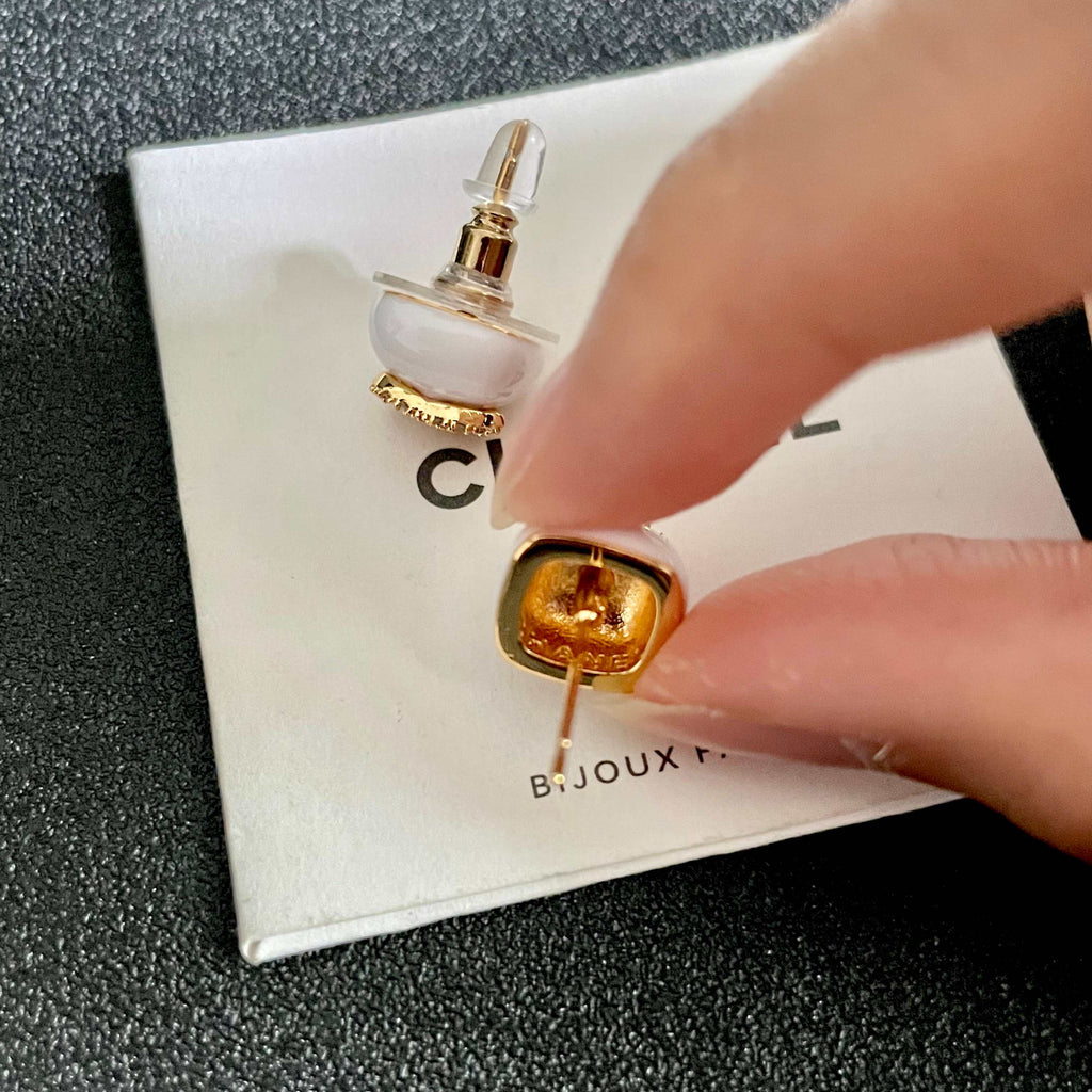 CHANEL 26S CHANEL CC LOGO PAVE CRYSTAL STUD EARRINGS IN WHITE ENAMEL WITH GOLD METAL 633309