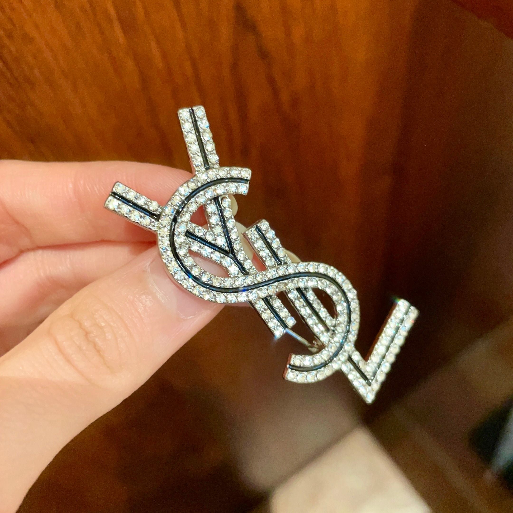 YSL 26S CRYSTAL LOGO BROOCH IN SILVER TONE METAL 634974