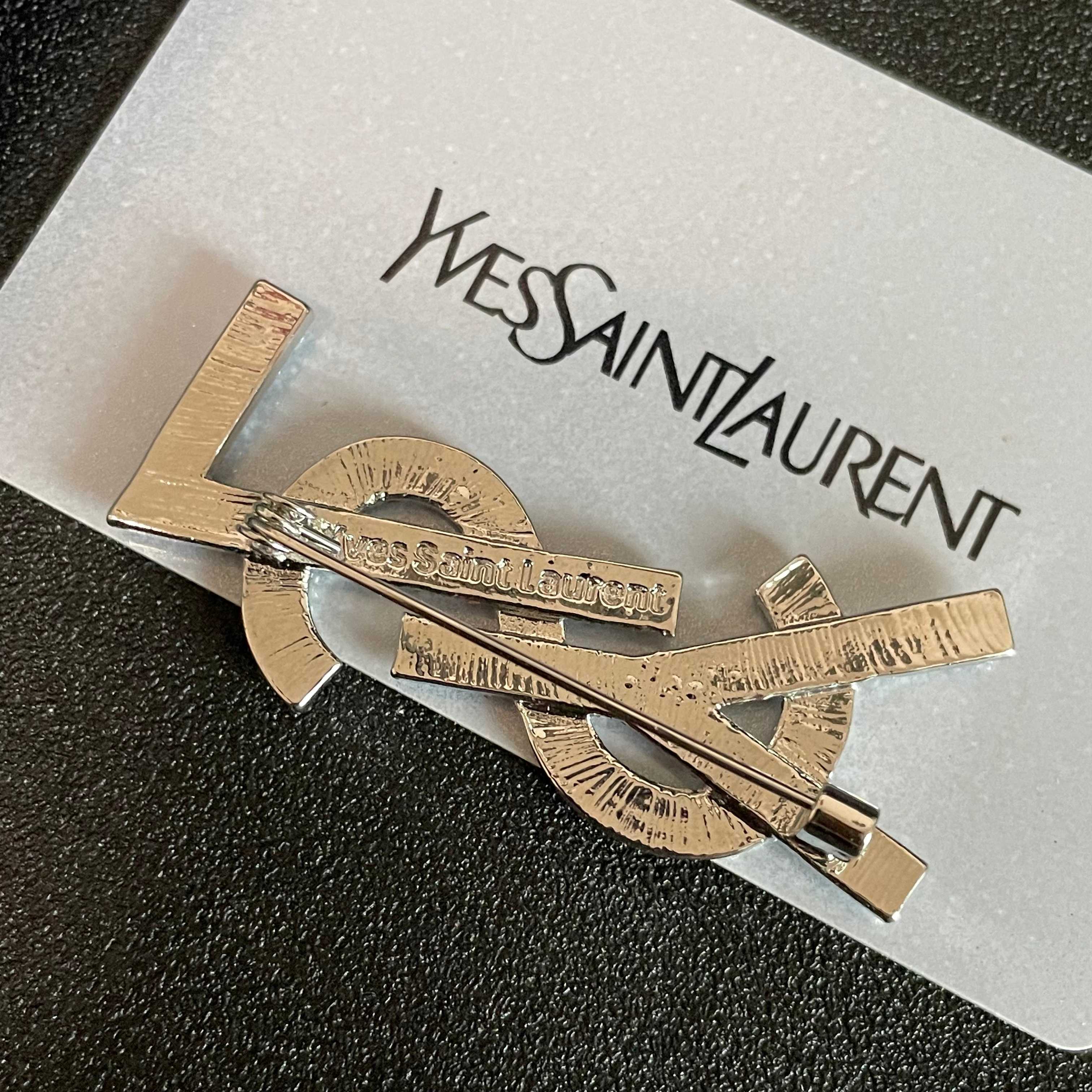 YSL 26S CRYSTAL LOGO BROOCH IN SILVER TONE METAL 634974