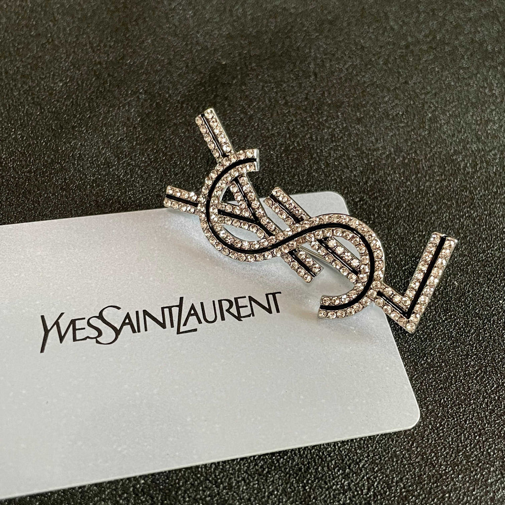 YSL 26S CRYSTAL LOGO BROOCH IN SILVER TONE METAL 634974