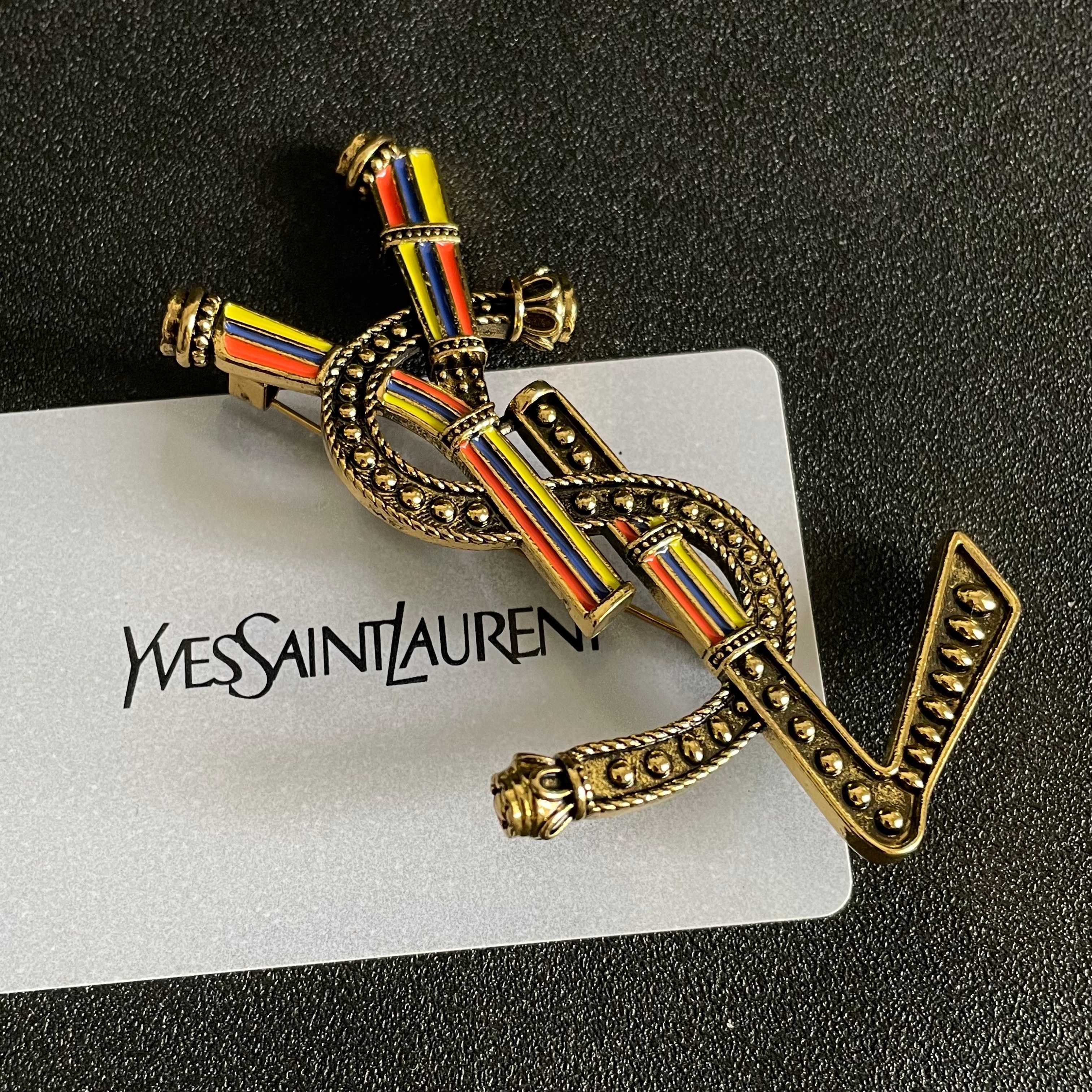 YSL 26S RAINBOW STRIPE LOGO BROOCH IN AGED GOLD TONE METAL 634975