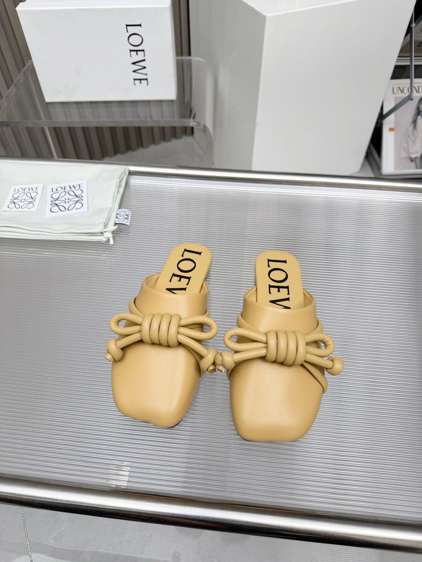 LOEWE 26S MULE LOAFERS IN WARM BEIGE CALFSKIN KNOT DETAIL